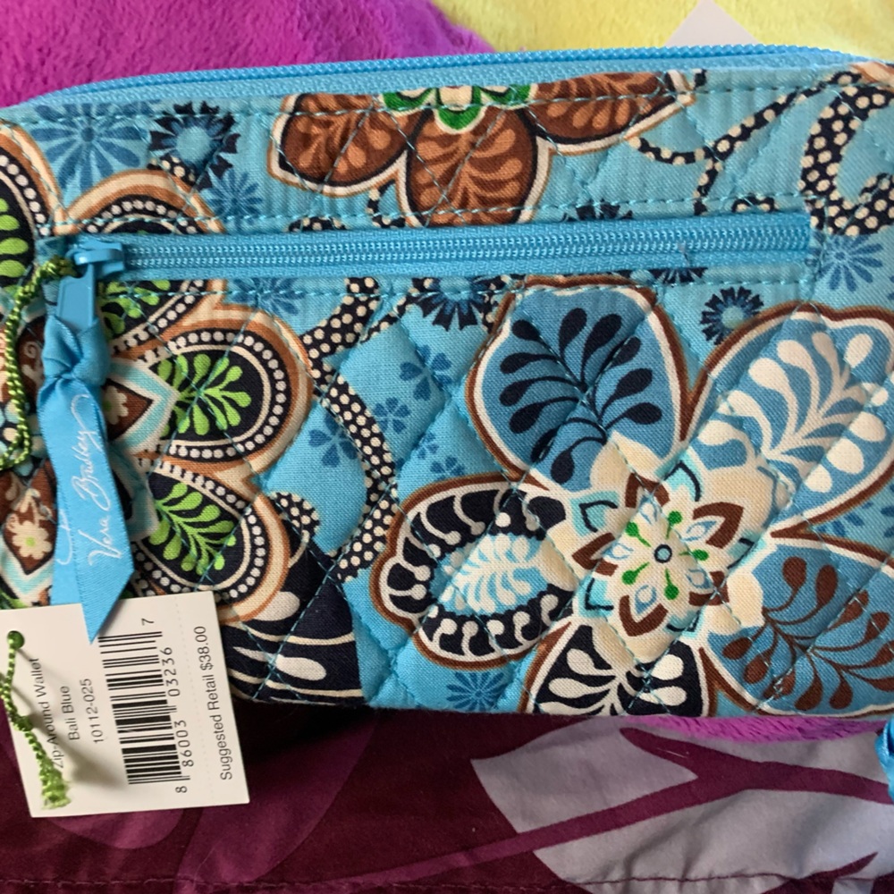 Vera Bradley zip around Bali blue wallet.